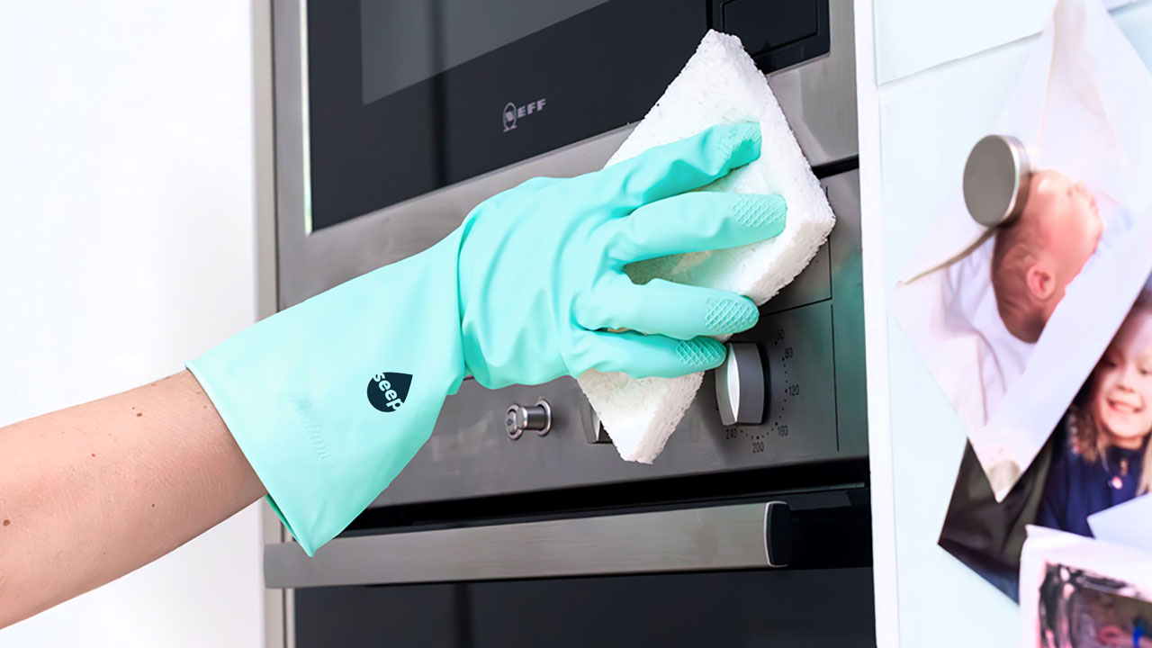 Oven cleaning with Seep gloves and sponge
